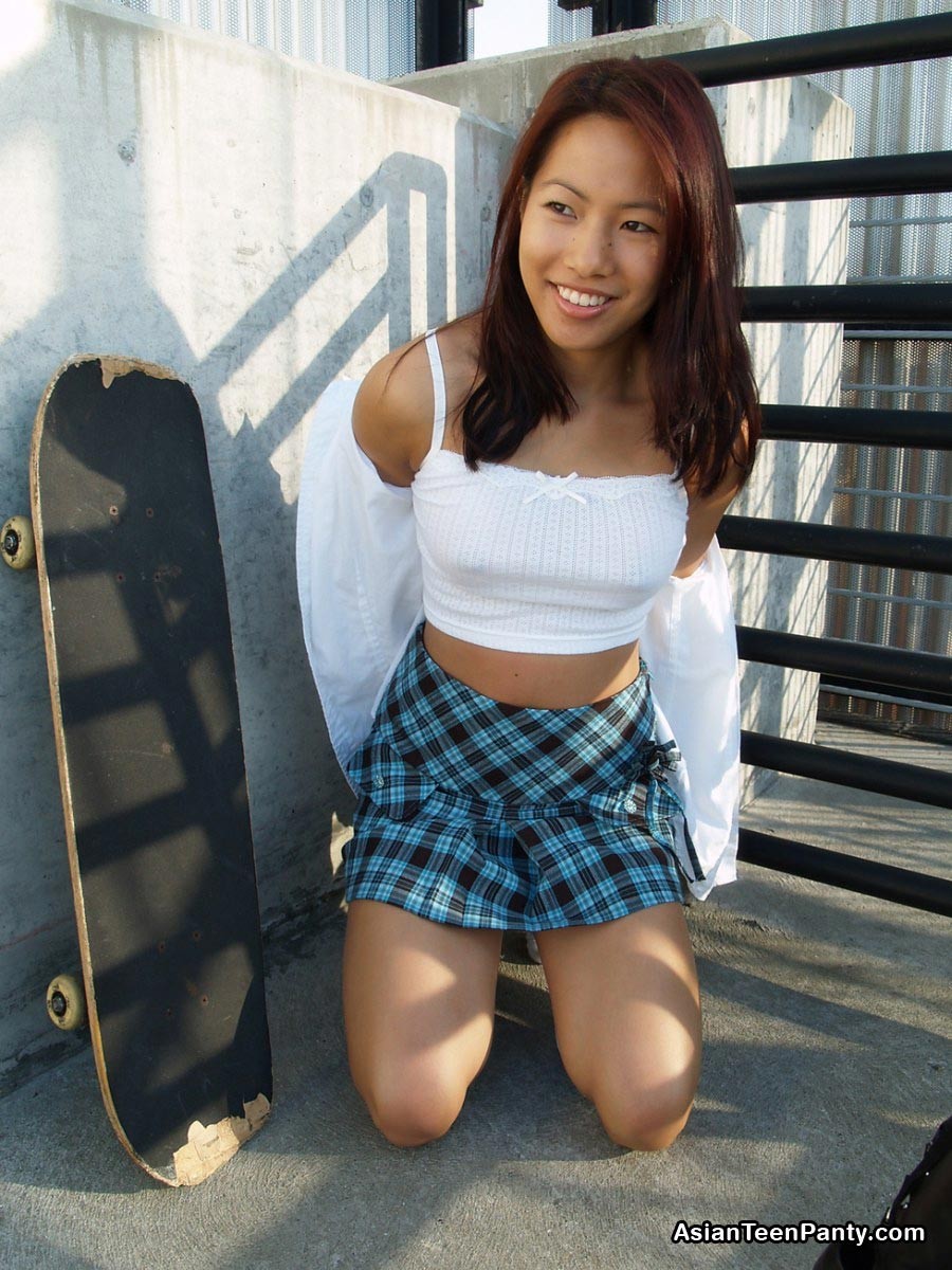 asian teen skateboarder in skirt #69974091