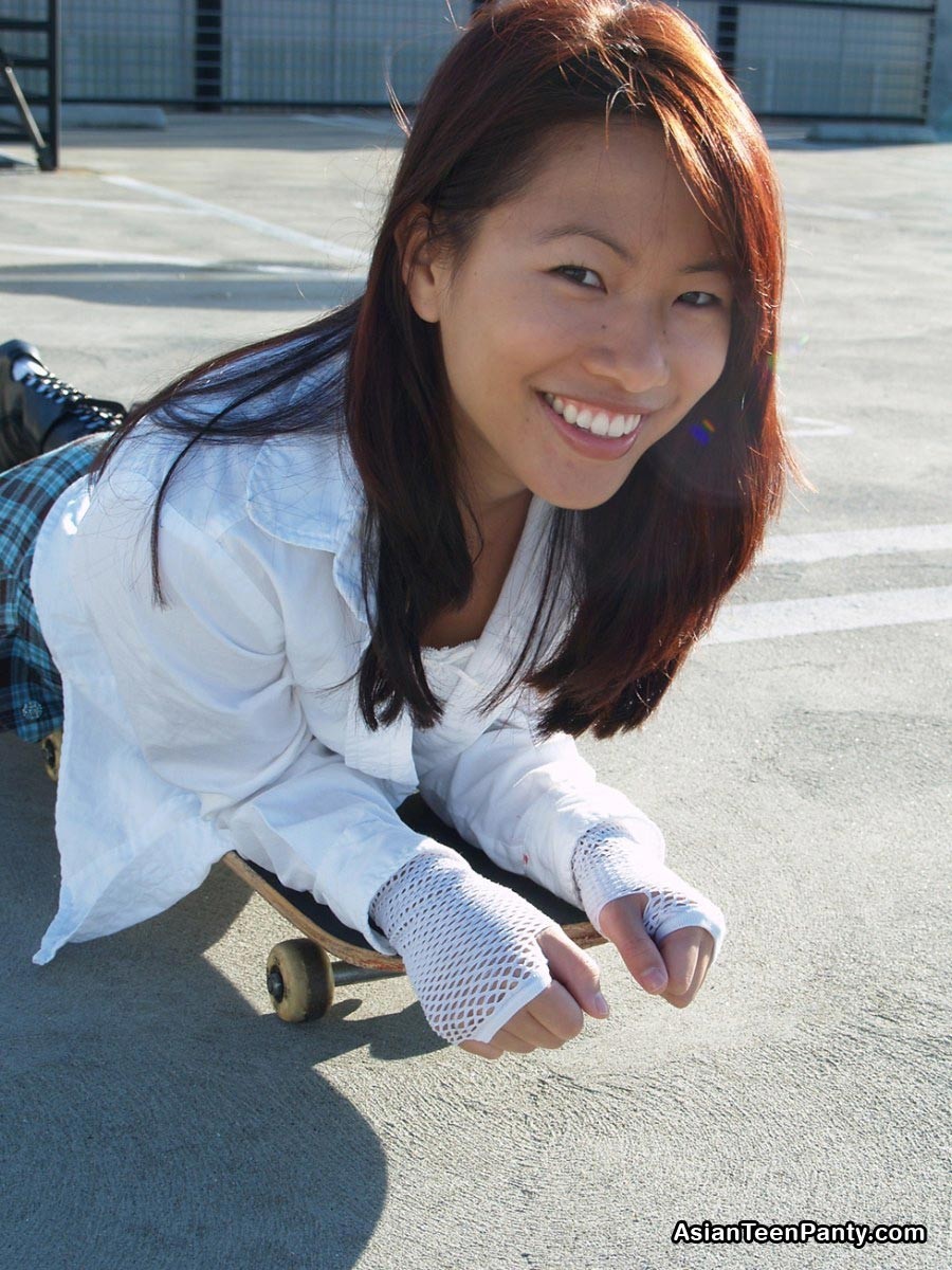 asian teen skateboarder in skirt #69974159