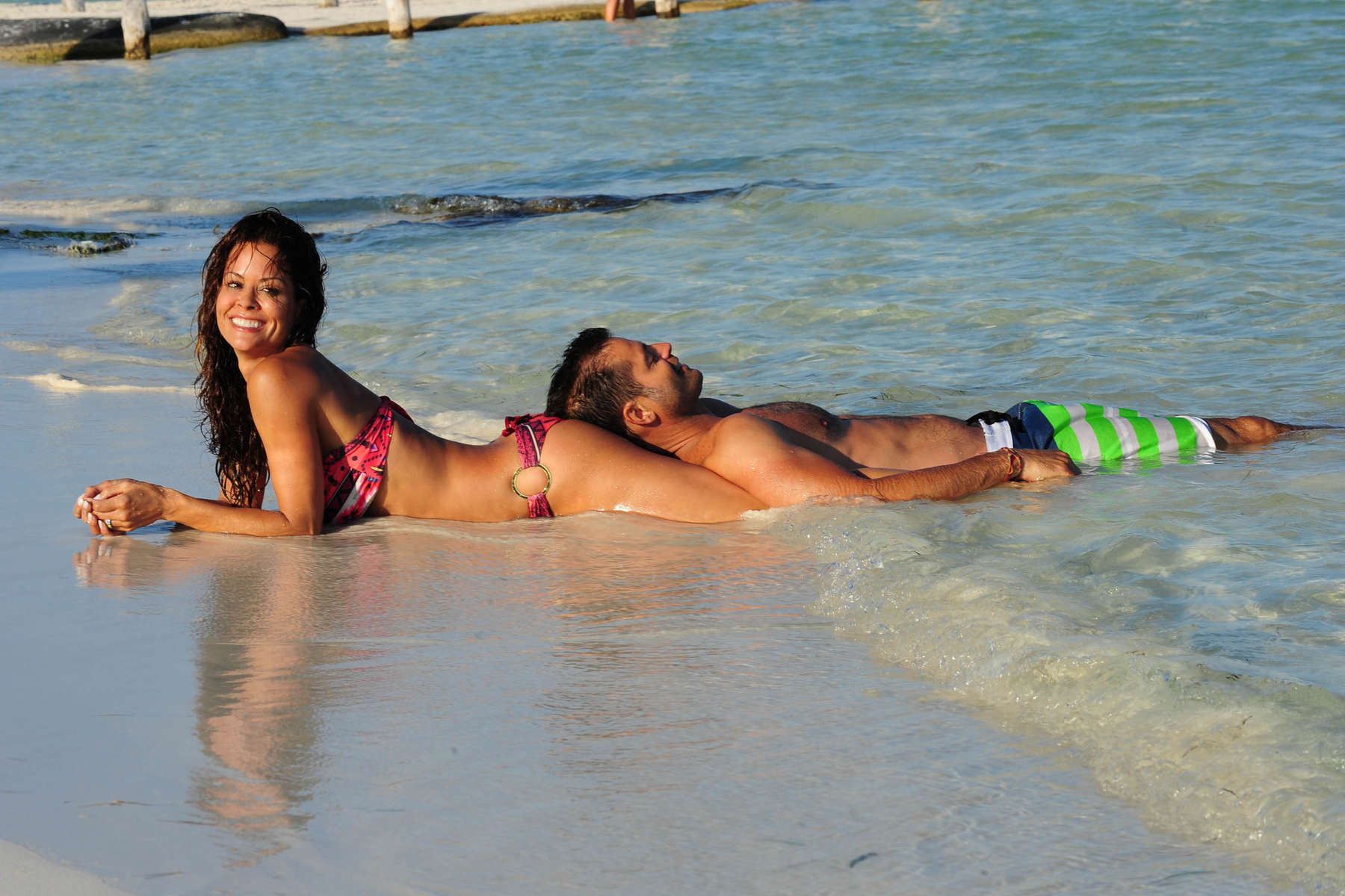 Brooke Burke doing a bikini photoshoot on a beach in Mexico #75228517