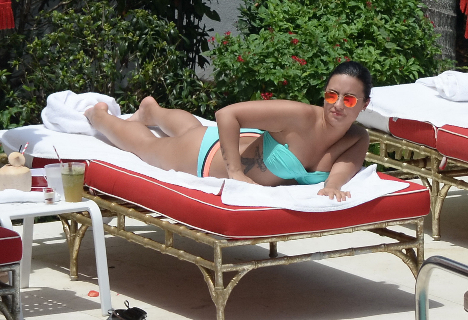 Demi Lovato shows off her ass in a bright blue bikini #75140641