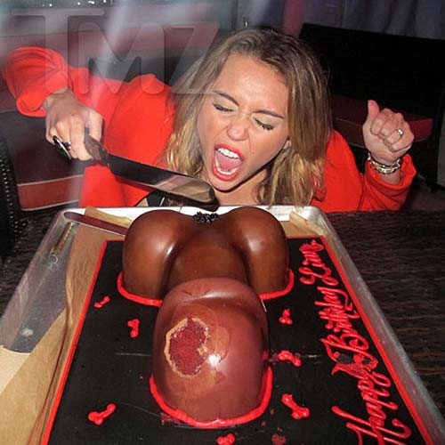Miley Cyrus licking a huge black penis cake at some party #75275769