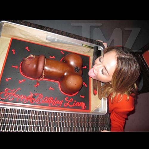 Miley cyrus licking a huge black penis cake at some party
 #75275777