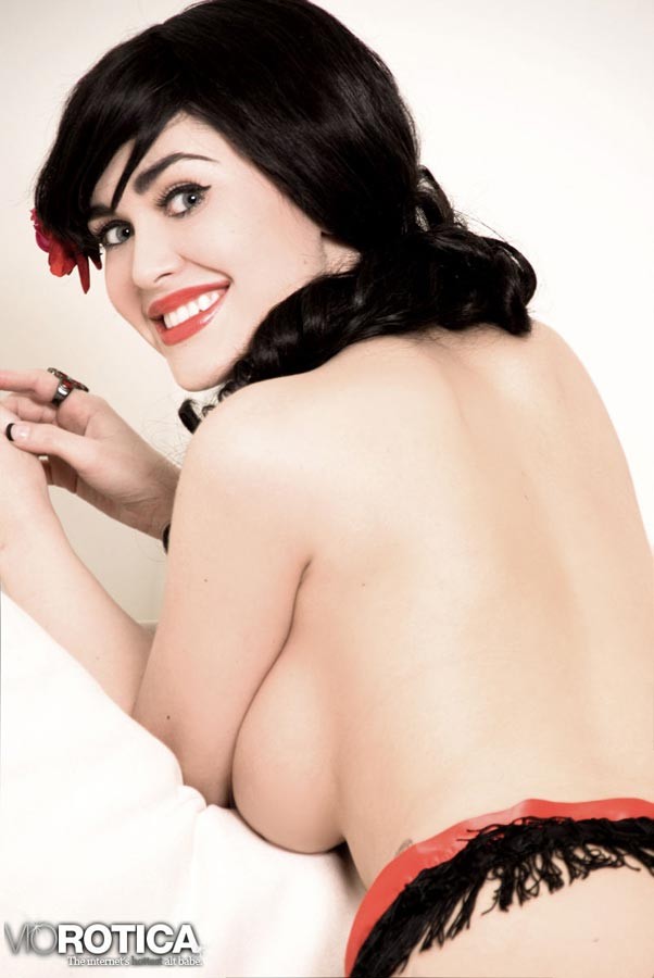 Brunette bombshell Violet Erotica posing in high heels and red fishnet stockings #70354123