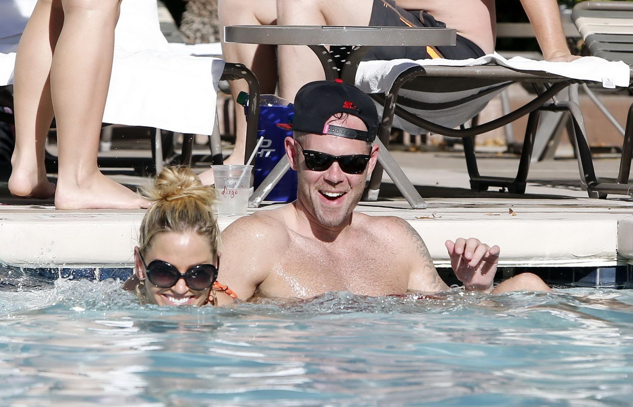 Sarah Harding wearing an orange bikini at the pool in Las Vegas #75208793