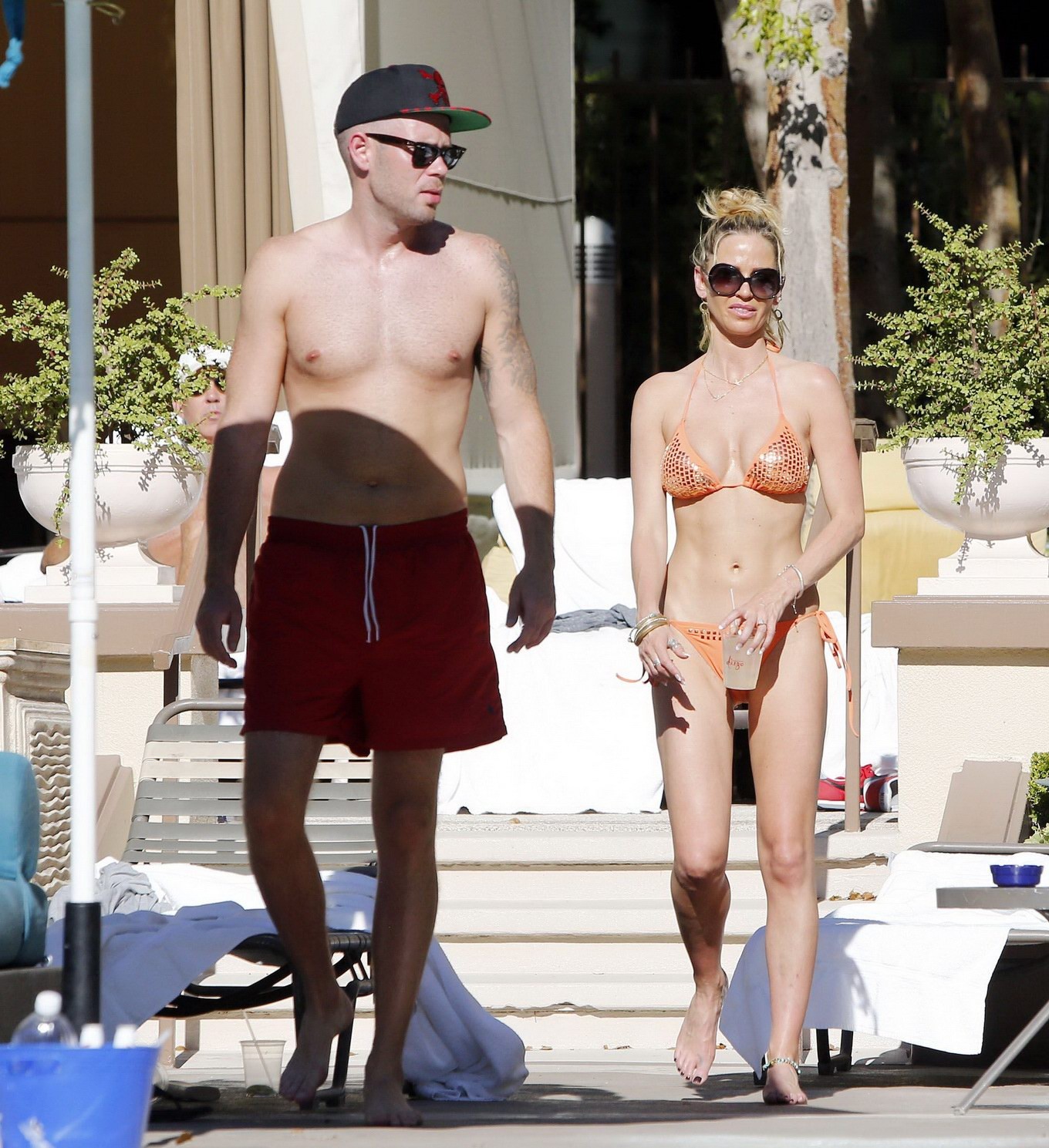 Sarah Harding wearing an orange bikini at the pool in Las Vegas #75208851