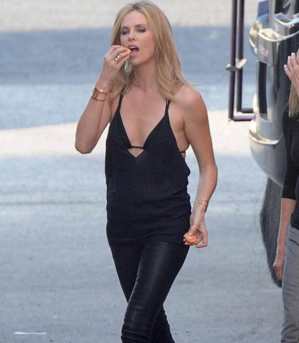 Charlize Theron shows tits and nude body