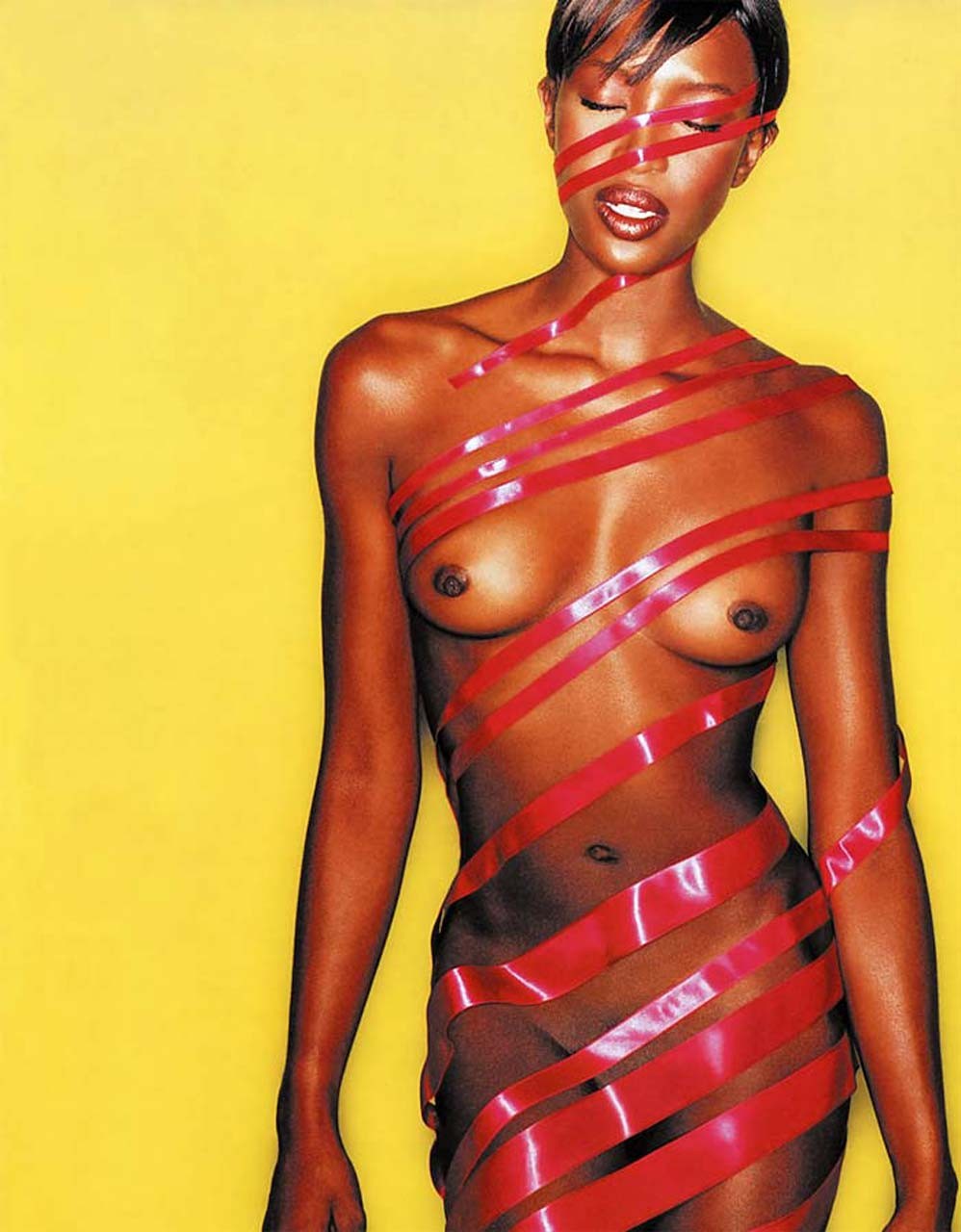 Naomi Campbell posing nude with some guy and girl and exposing her tiny tits and #75314133