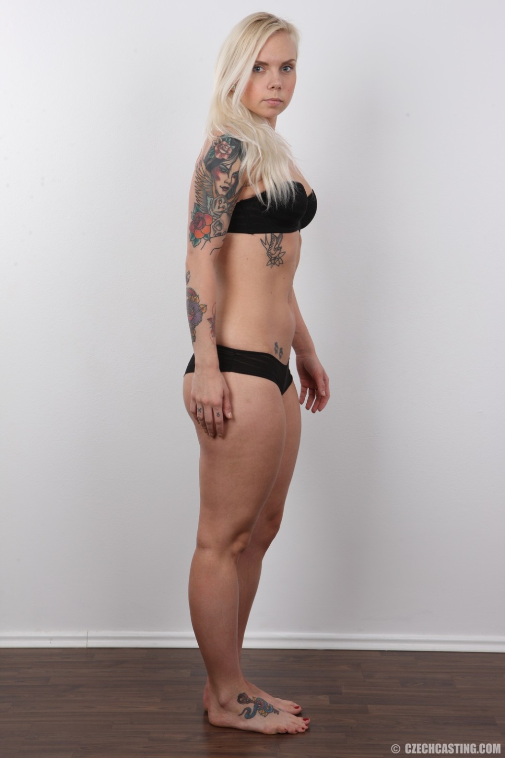 Tattooed amateur blonde poses nude #67109183