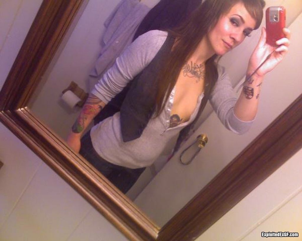 Amateur girl with lots of tattos posing #71651572