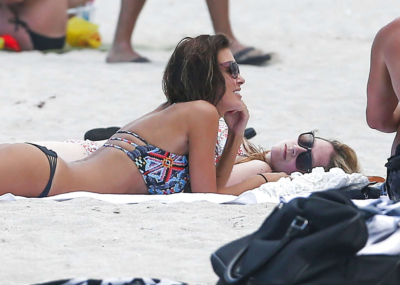 Audrina Patridge exposing perfect body in bikini on beach