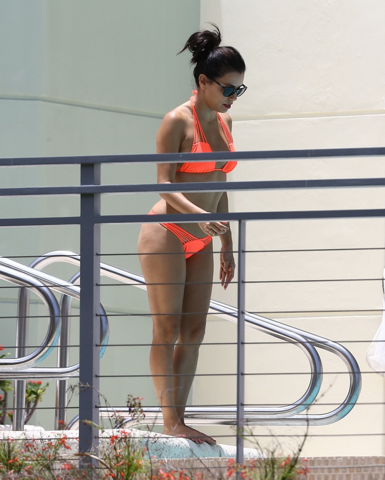 Eva Longoria shows nipple pokies in orange bikini poolside #75160099