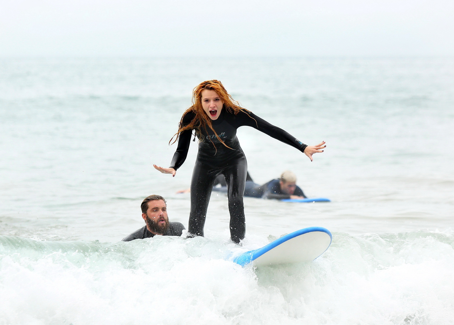 Bella Thorne in bikini and wetsuit surfing at the Surf Camp #75159200