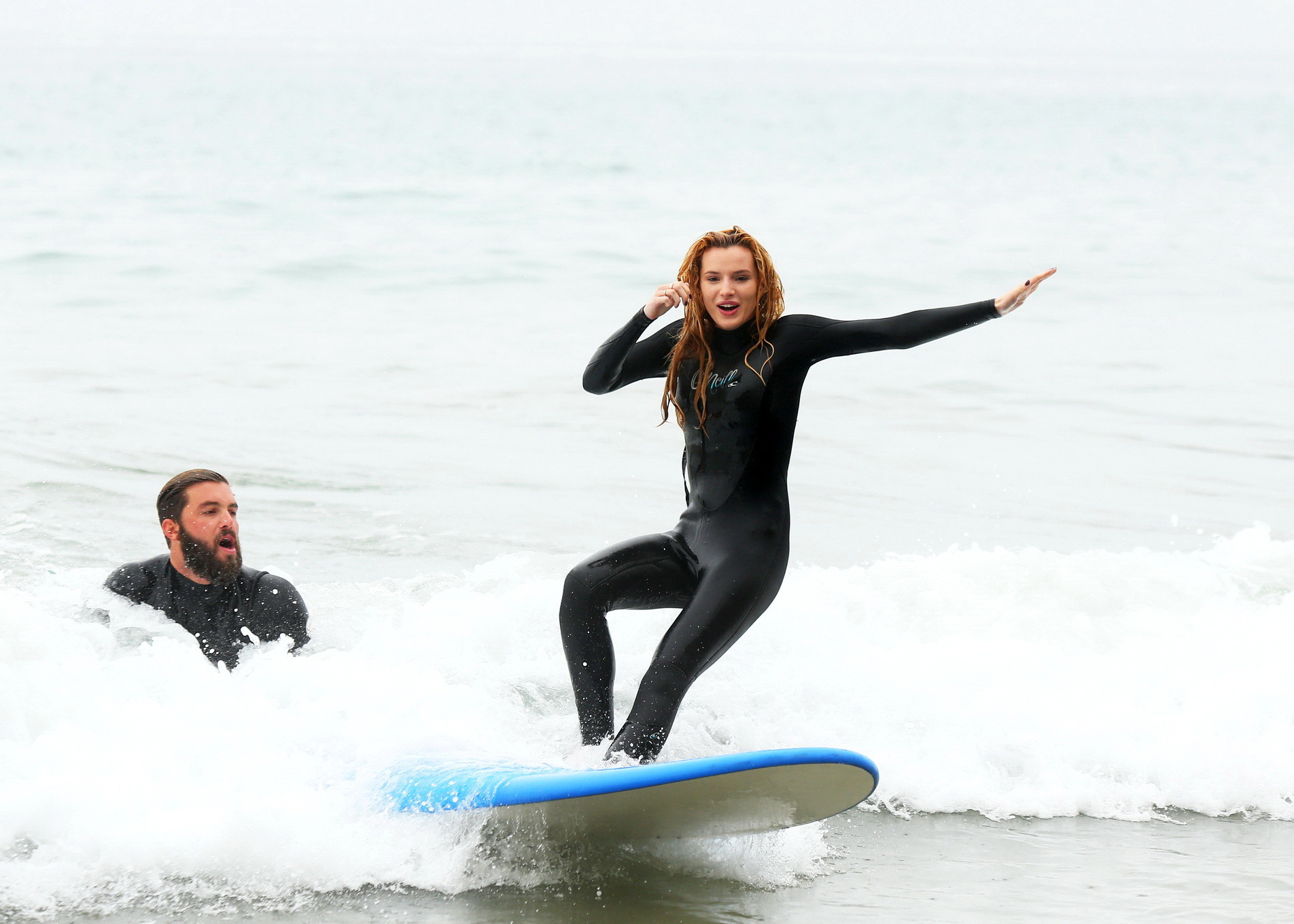 Bella Thorne in bikini and wetsuit surfing at the Surf Camp #75159236