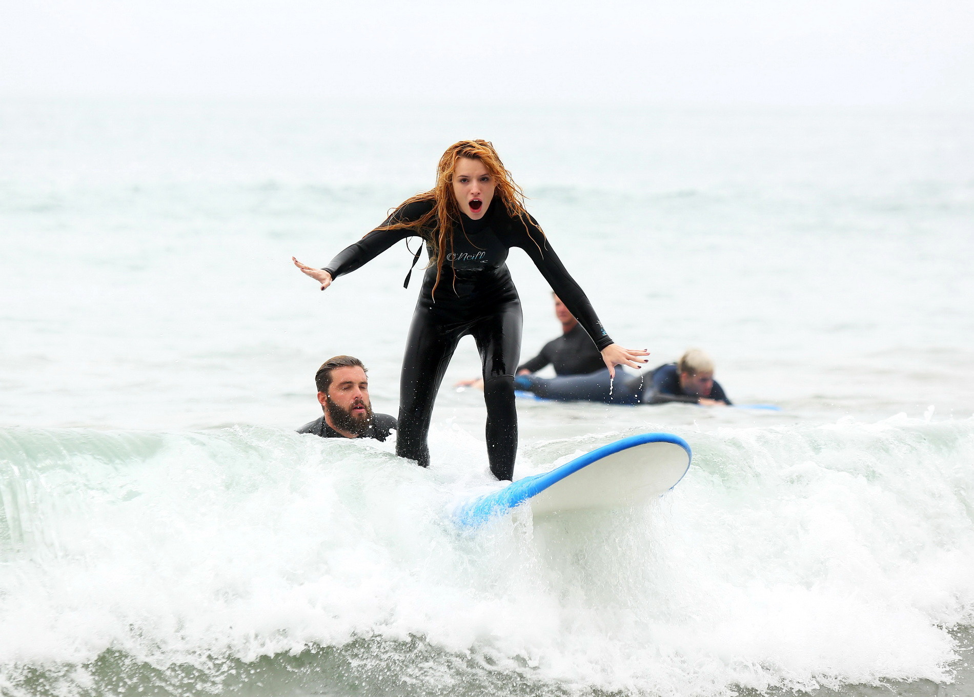 Bella Thorne in bikini and wetsuit surfing at the Surf Camp #75159257