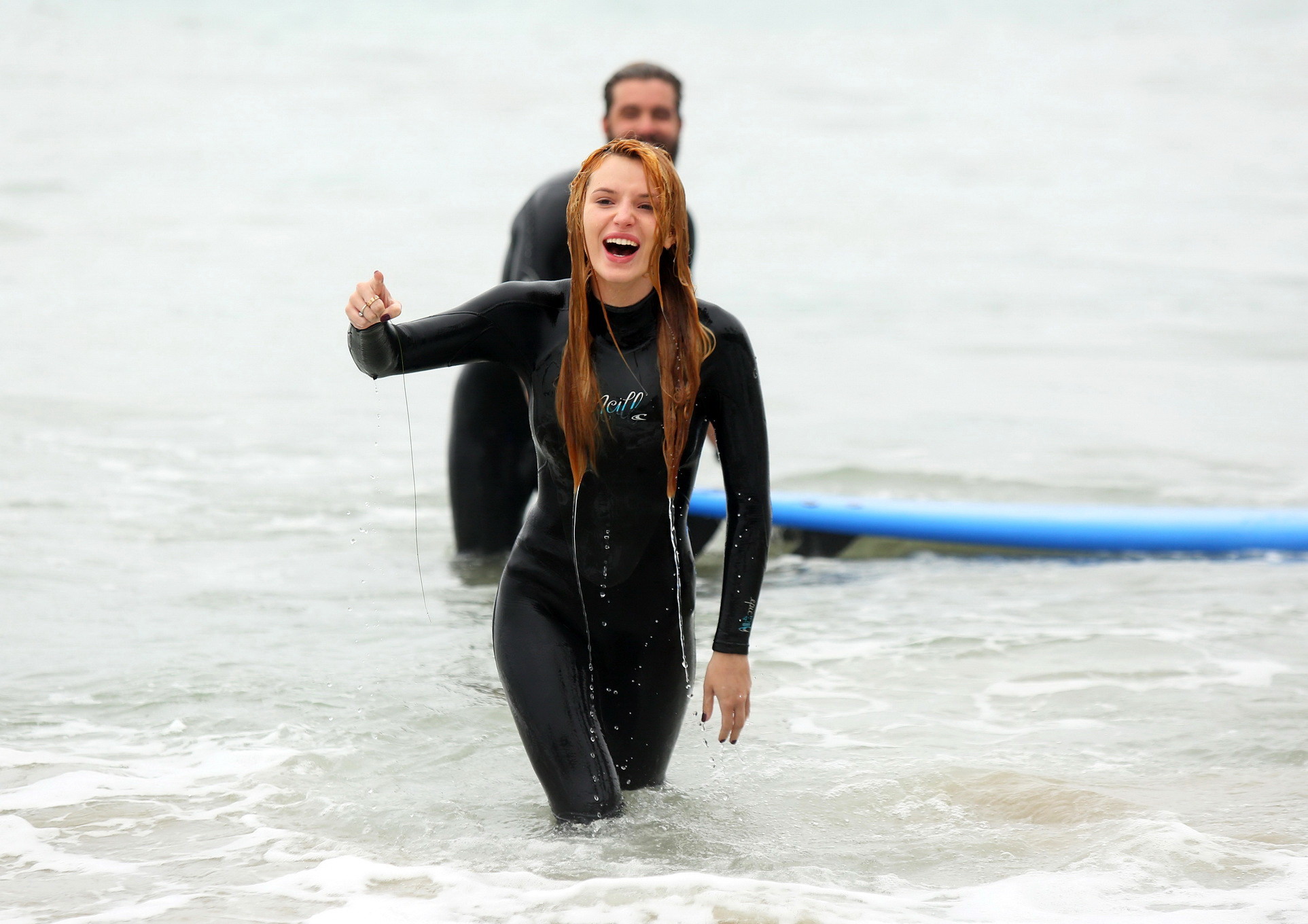 Bella Thorne in bikini and wetsuit surfing at the Surf Camp #75159261