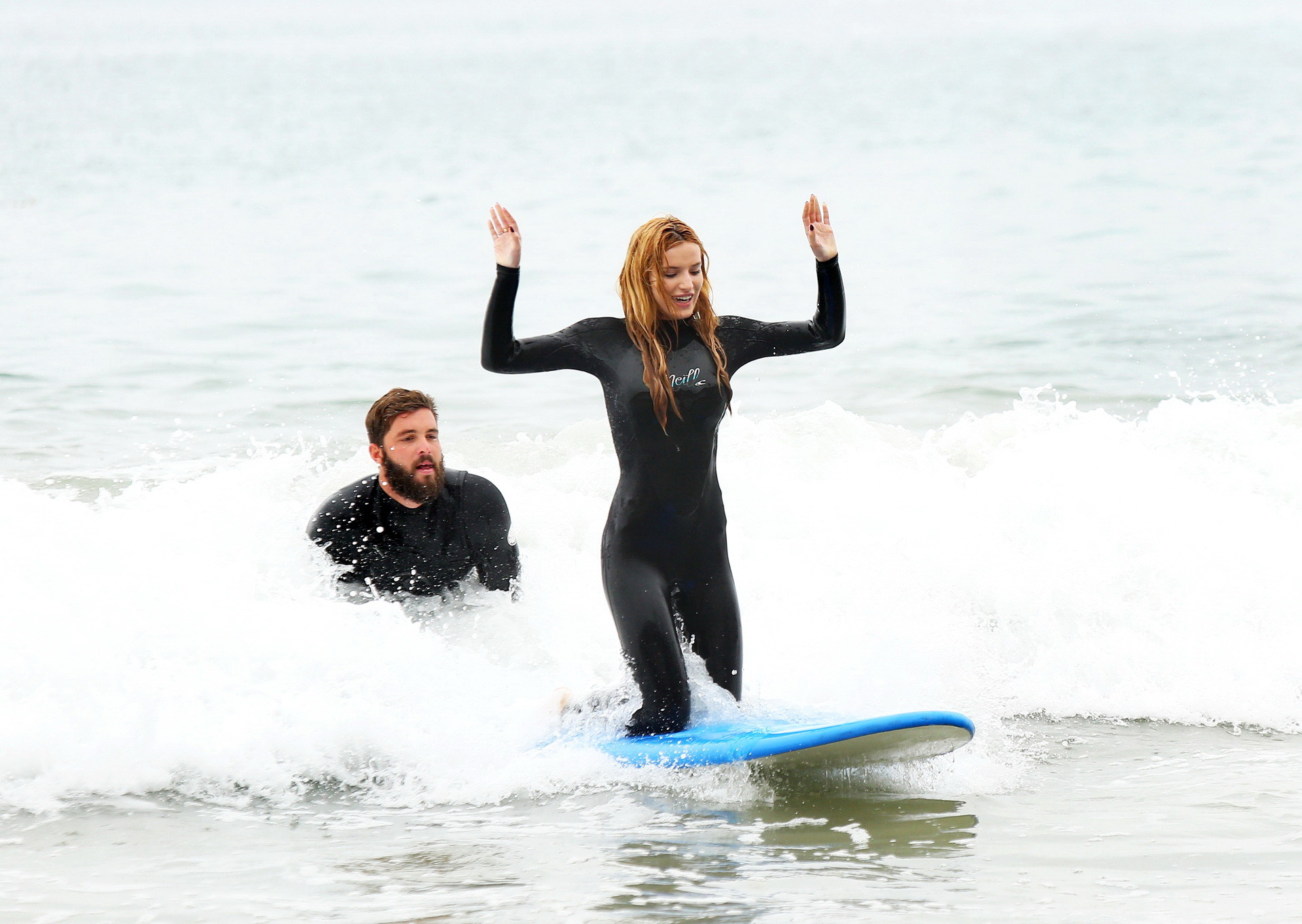 Bella Thorne in bikini and wetsuit surfing at the Surf Camp #75159271