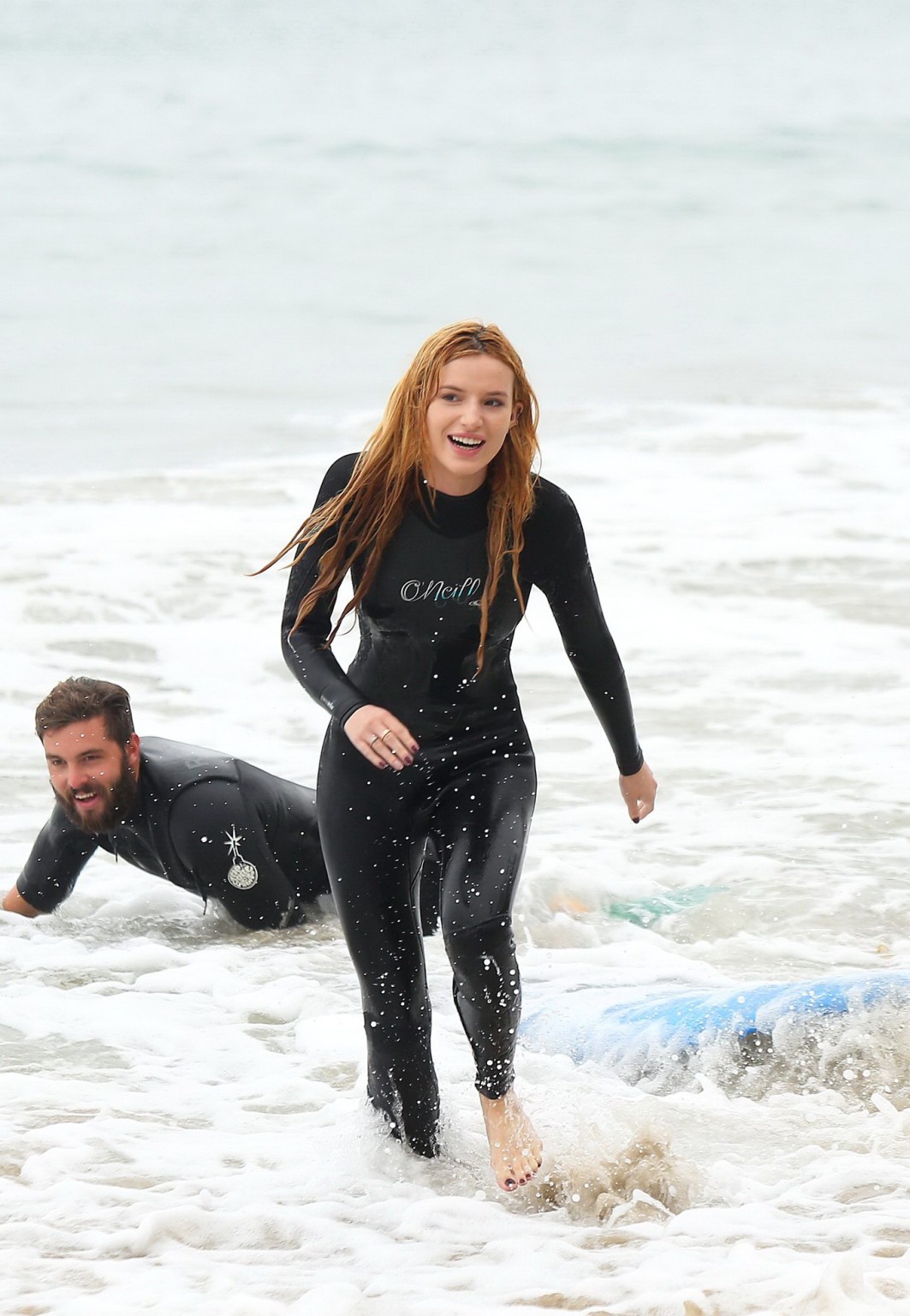 Bella Thorne in bikini and wetsuit surfing at the Surf Camp #75159277