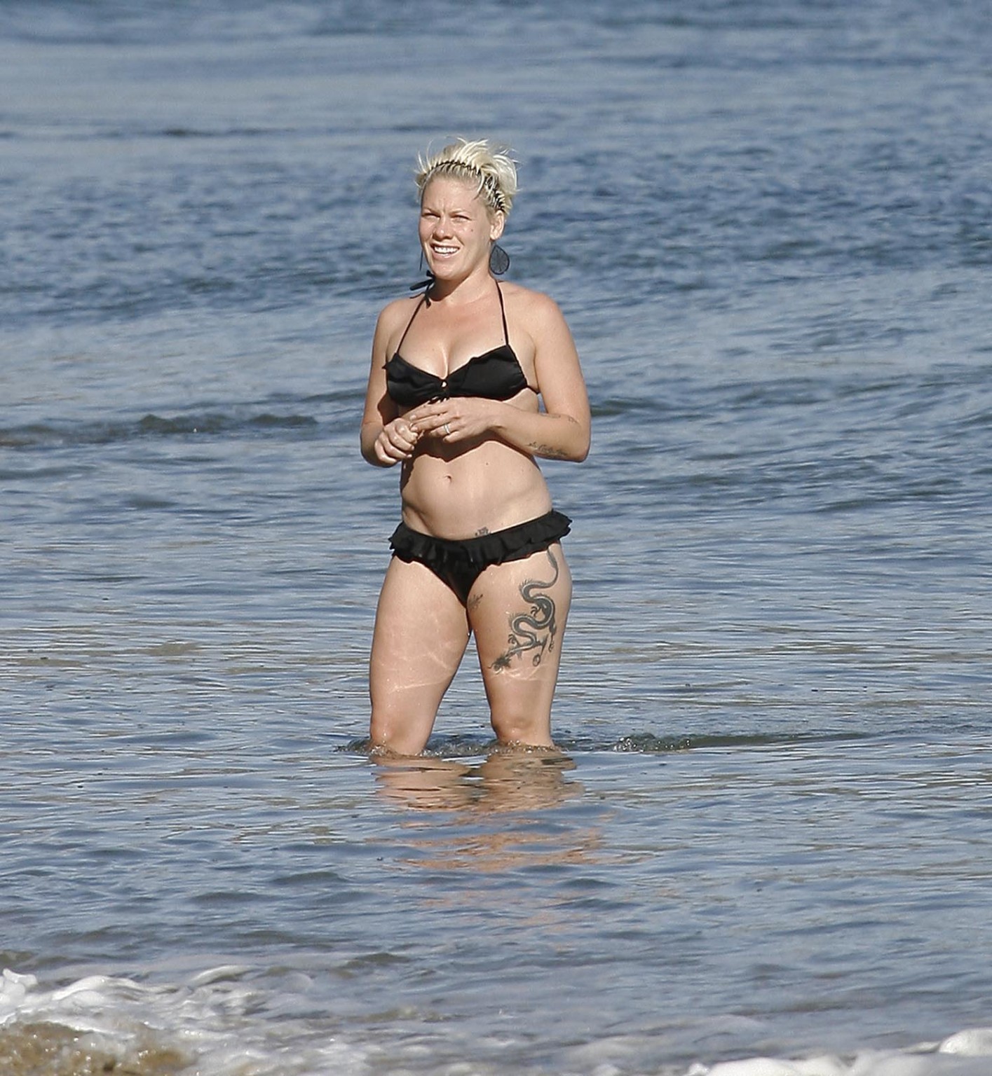 Pink pregnant wearing sexy black bikini on the beach in LA #75326528