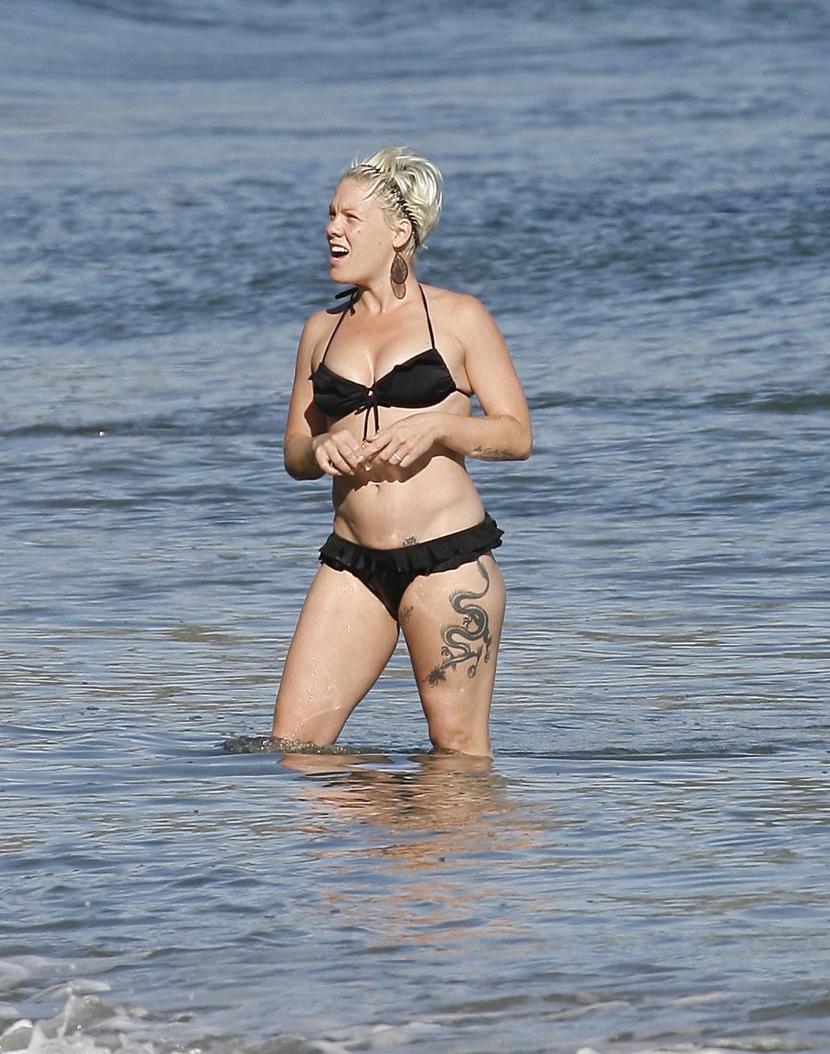Pink pregnant wearing sexy black bikini on the beach in LA #75326552