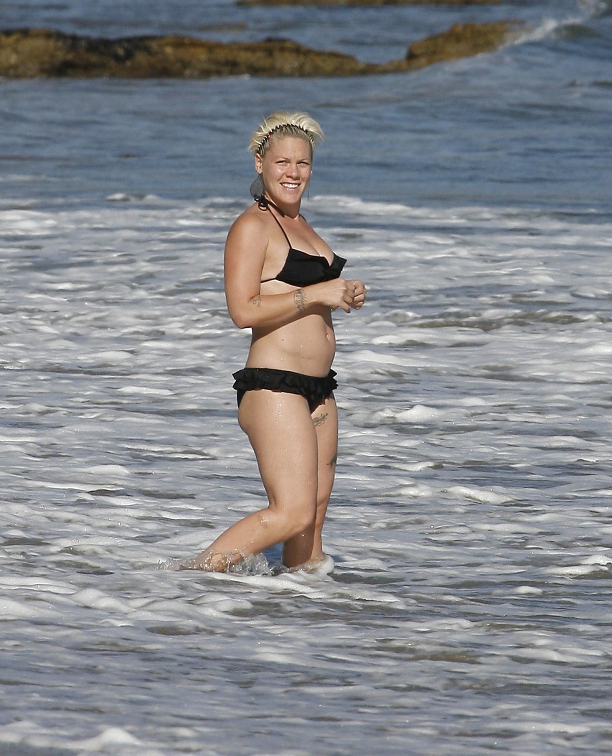 Pink pregnant wearing sexy black bikini on the beach in LA #75326608