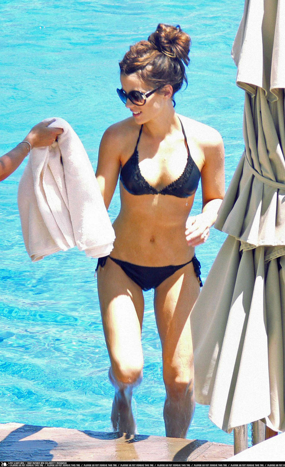 Kate Beckinsale très sexy dans un bikini photographié par des paparazzis.
 #75349634