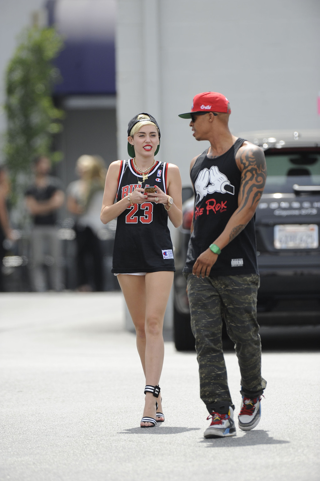 Miley Cyrus leggy wearing a shorts  a jersey outside a studio in LA #75227634