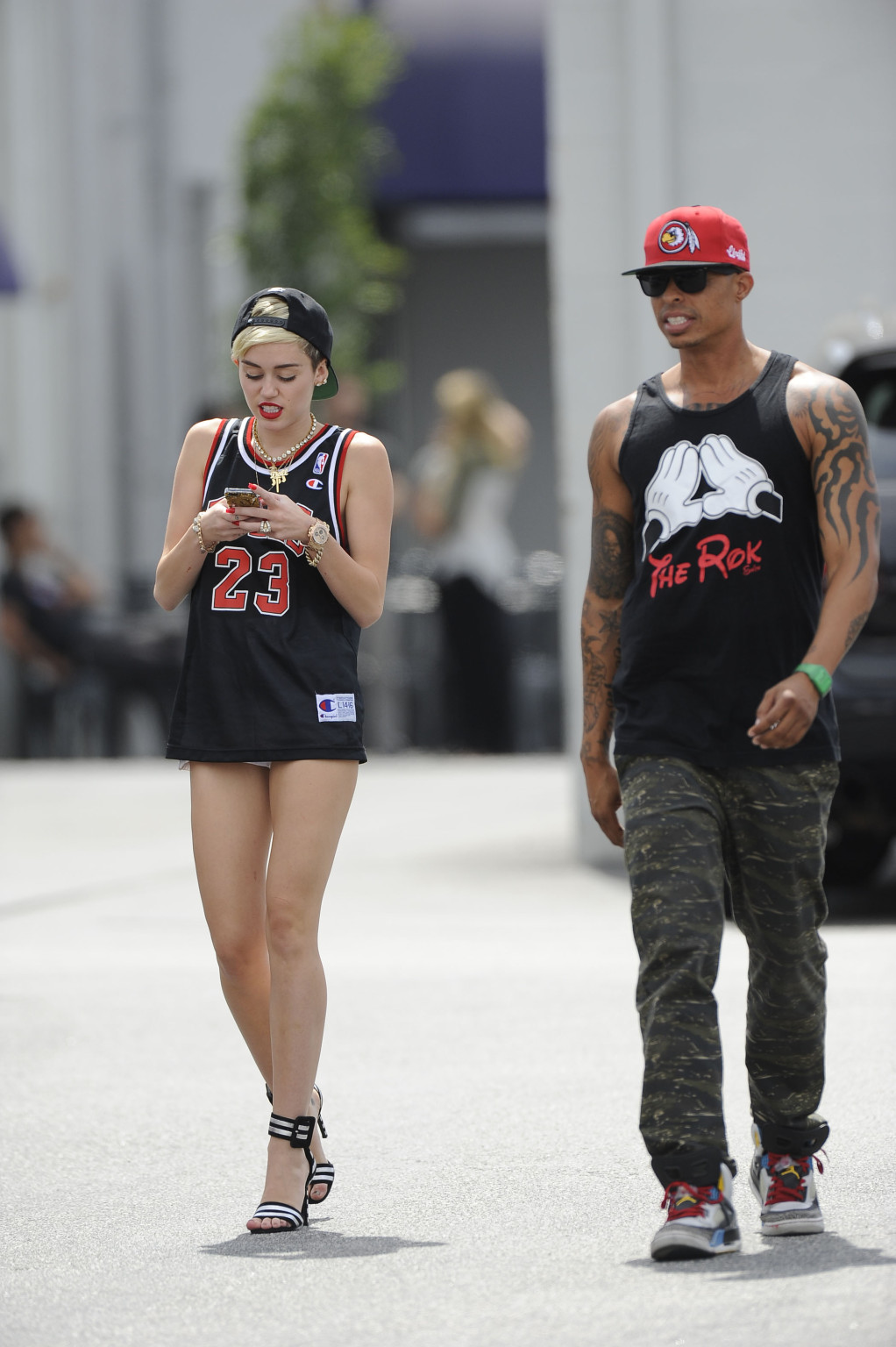 Miley cyrus luciendo piernas con un short y un jersey fuera de un estudio en la
 #75227647