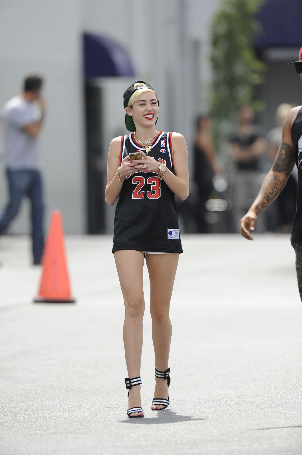 Miley Cyrus leggy wearing a shorts  a jersey outside a studio in LA #75227658