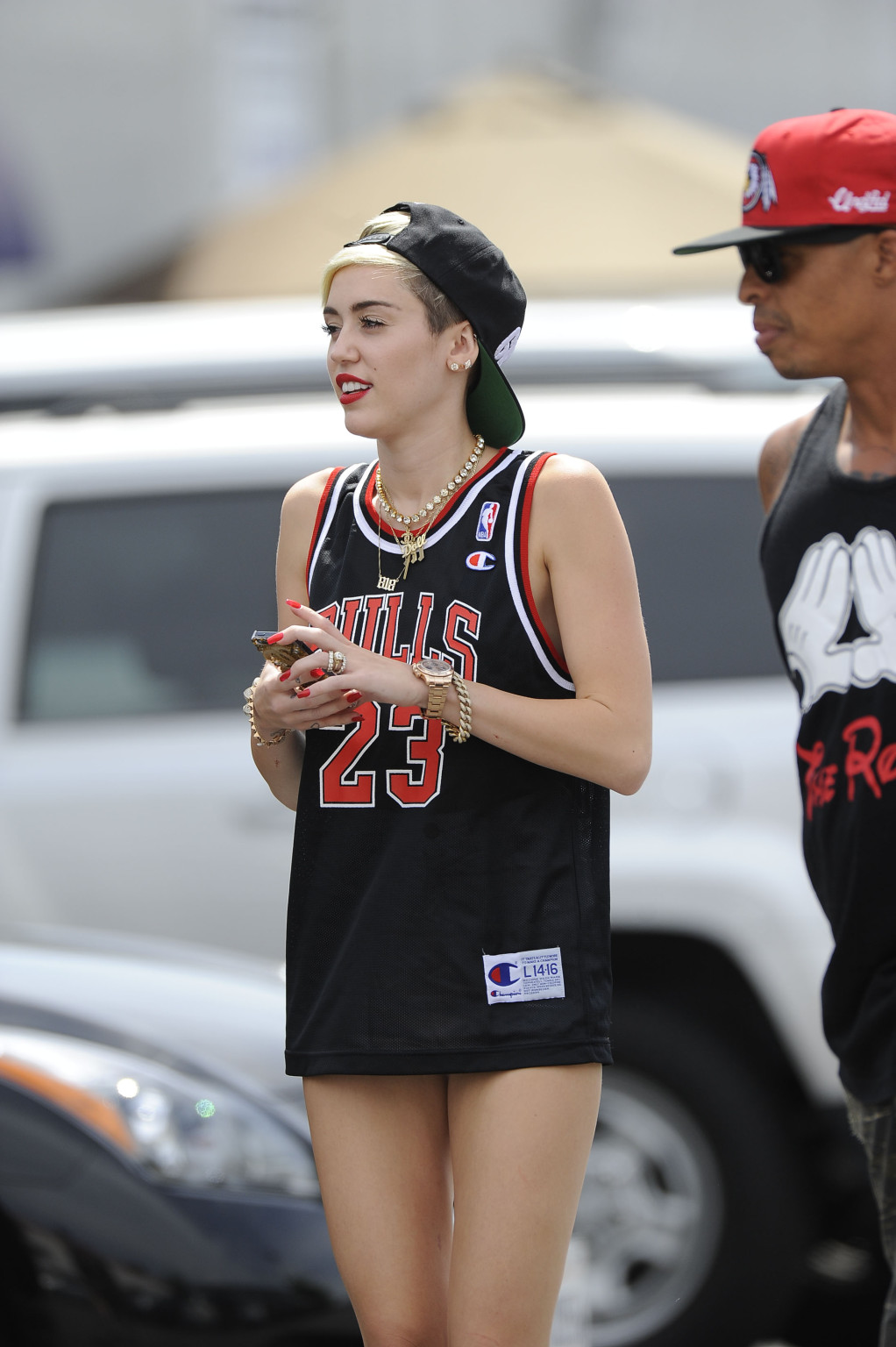 Miley Cyrus leggy wearing a shorts  a jersey outside a studio in LA #75227703