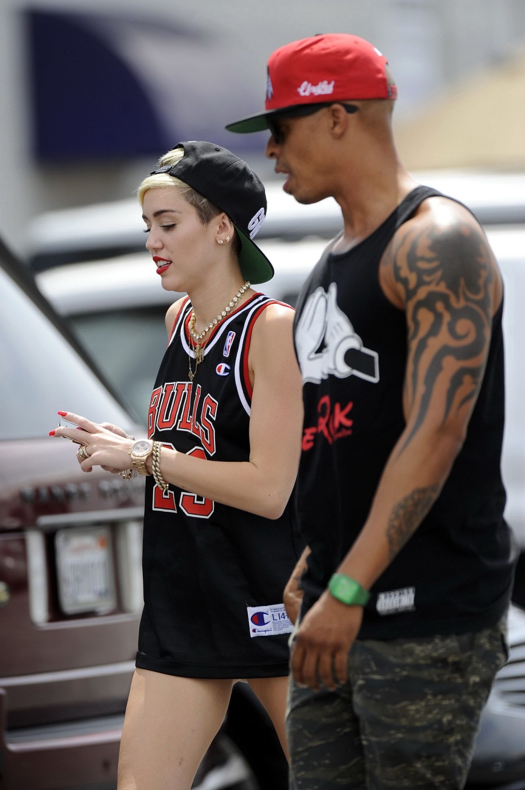 Miley Cyrus leggy wearing a shorts  a jersey outside a studio in LA #75227712