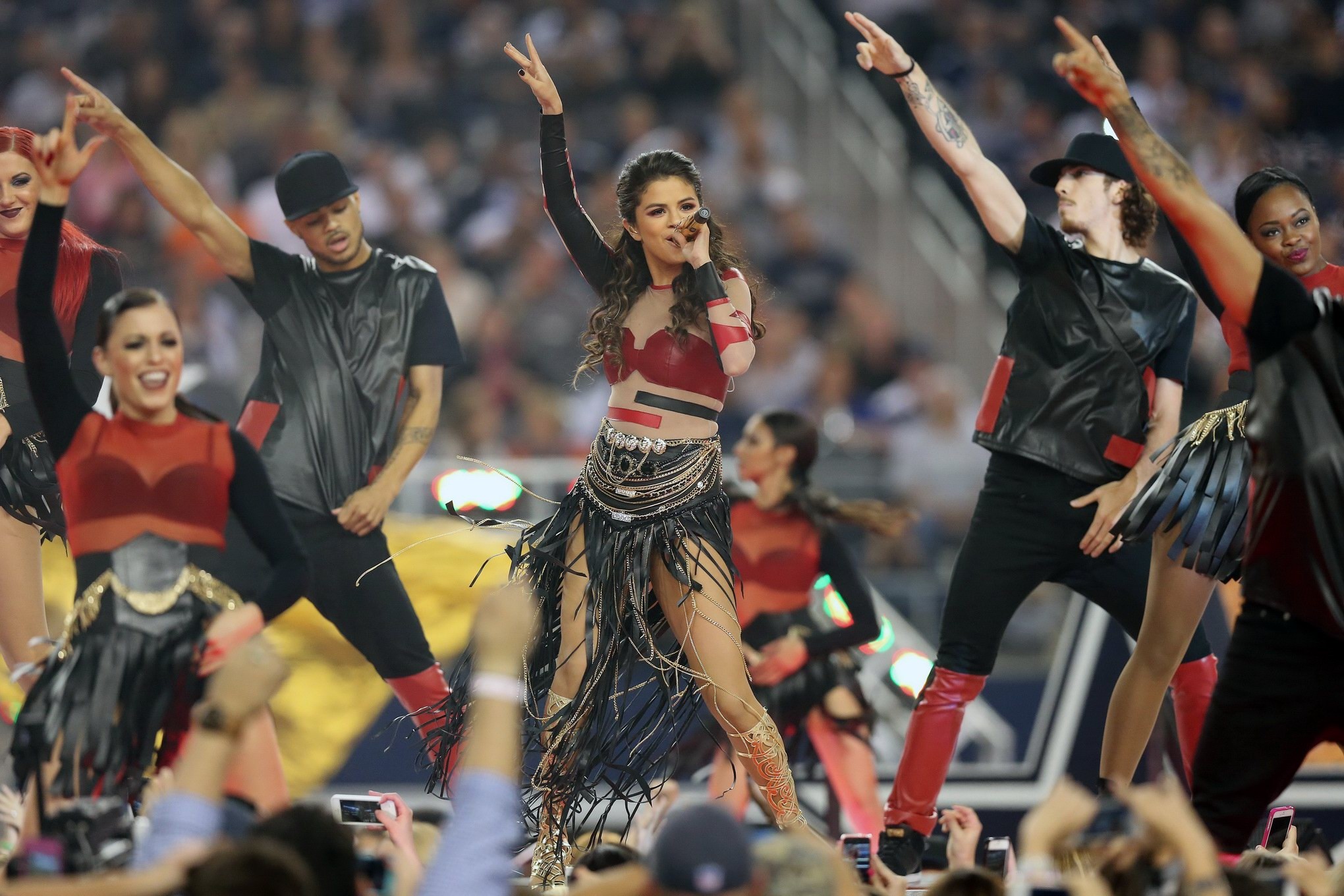 Selena Gomez wearing tiny red leather outfit on Dallas VS Oakland halftime show  #75211562