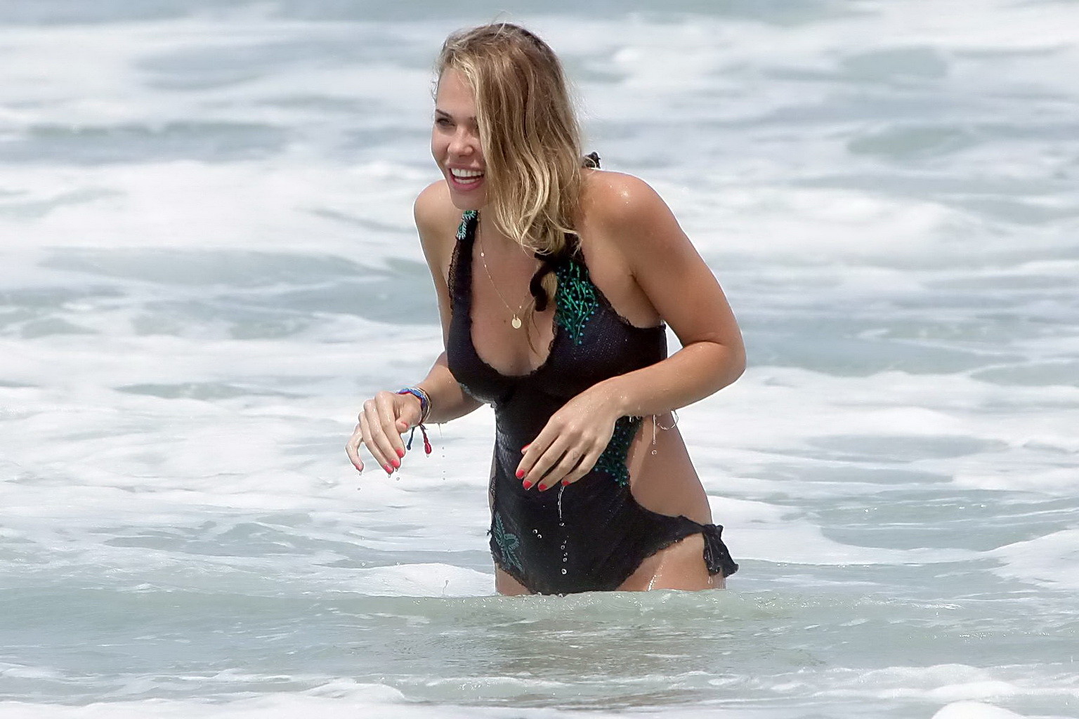 Ilary Blasi busty showing off her bare butt in a fallen bikini at the beach in S #75252794