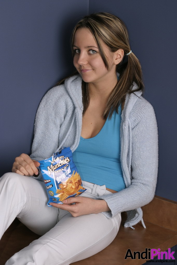 Cute teen girl eats chips #67210139