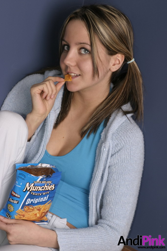 Cute teen girl eats chips #67210144