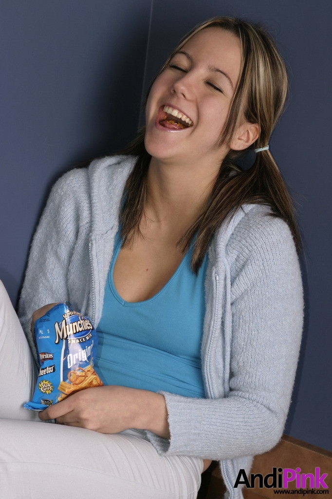 Cute teen girl eats chips #67210158