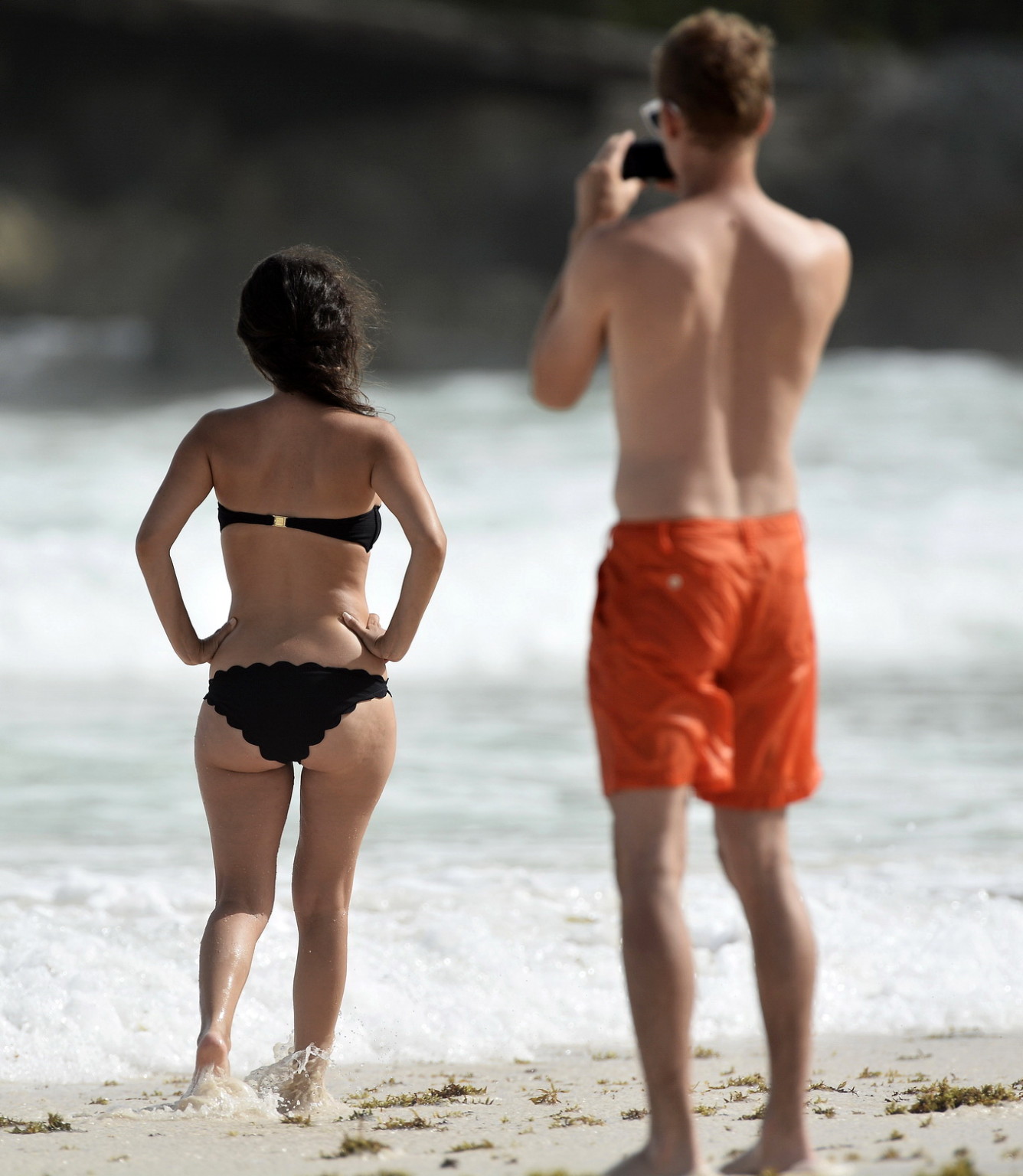 Rachel Bilson pregnant wearing a strapless black bikini on a beach in Barbados #75193860