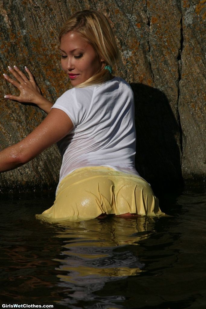 Pretty woman in wet dresses outdoor #72294306