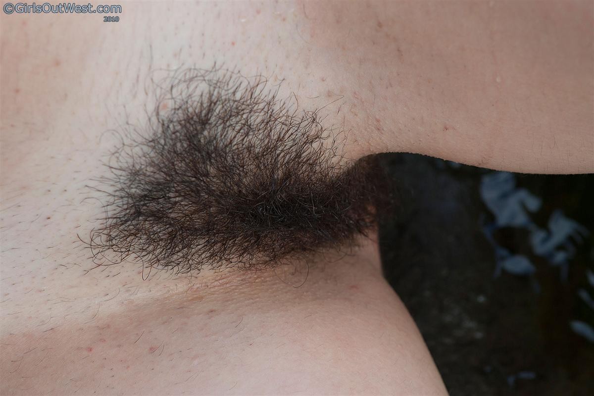 A hairy Australian amateur strips of in a river #77298249