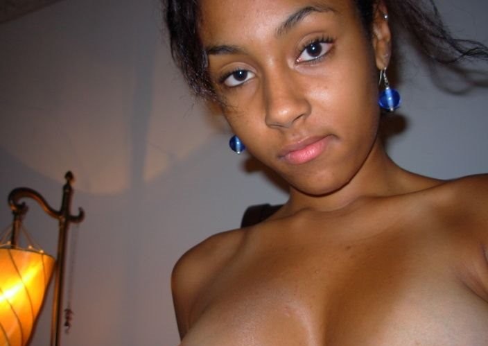Hot ebony teen shows off her titties for the camera #68268096