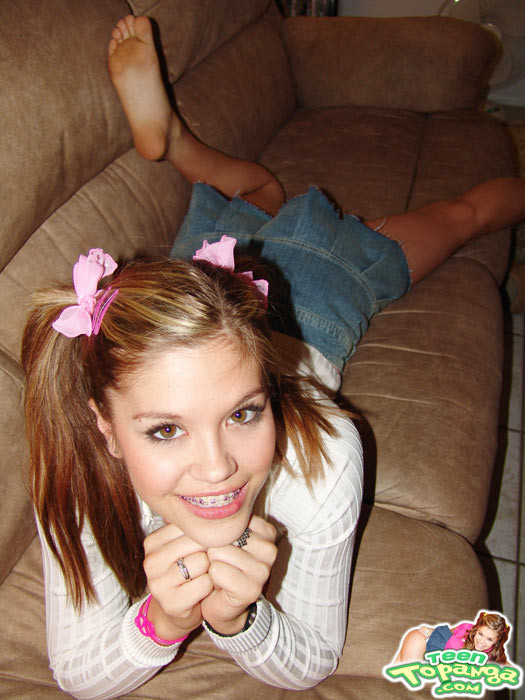 Sweet Teen Topanga teases in a pink top while laying on the couc #78796506
