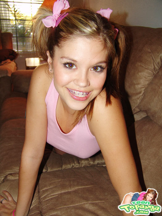 Sweet Teen Topanga teases in a pink top while laying on the couc #78796546