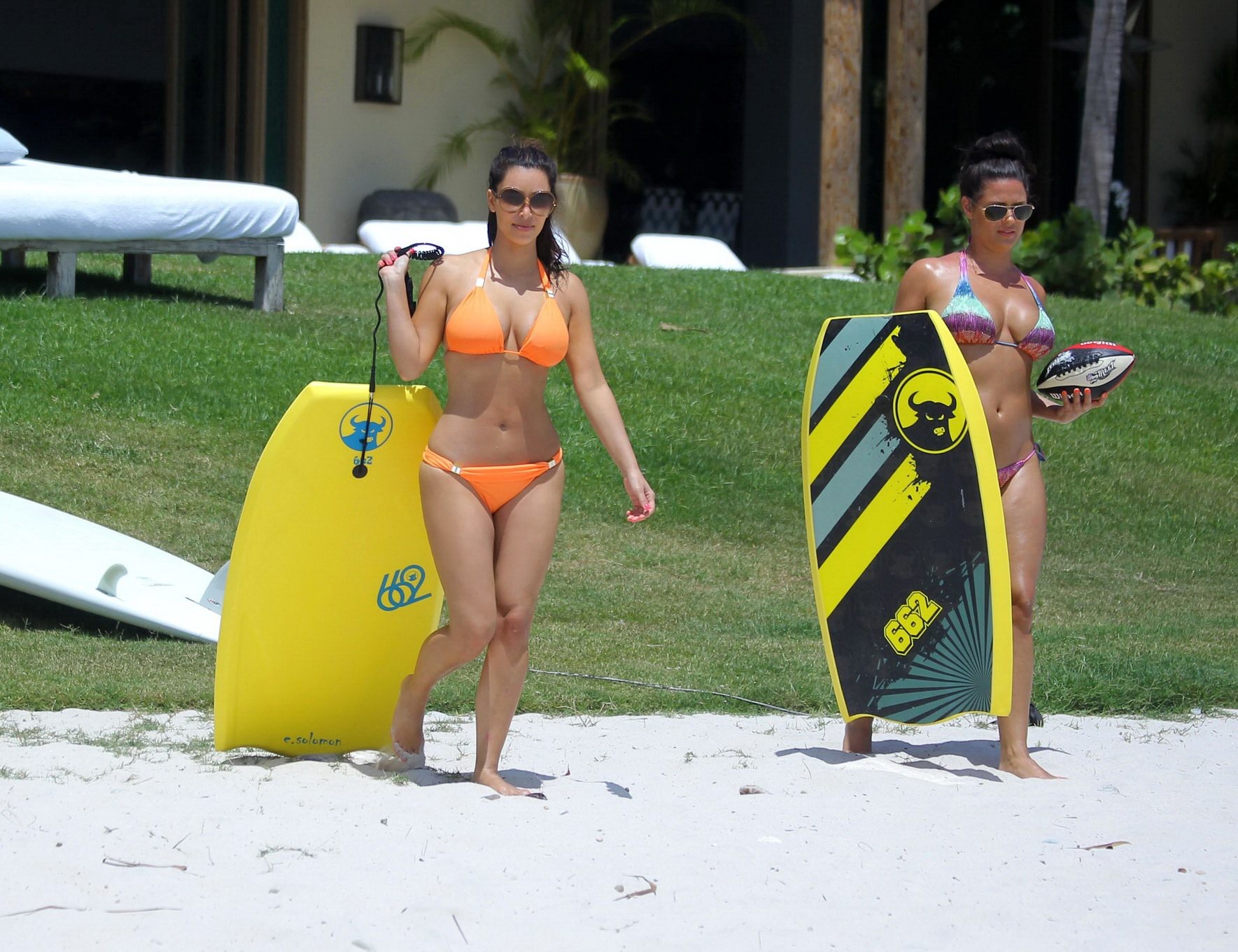 Kim Kardashian shows pokies in wet orange bikini while surfing in Mexico #75262267