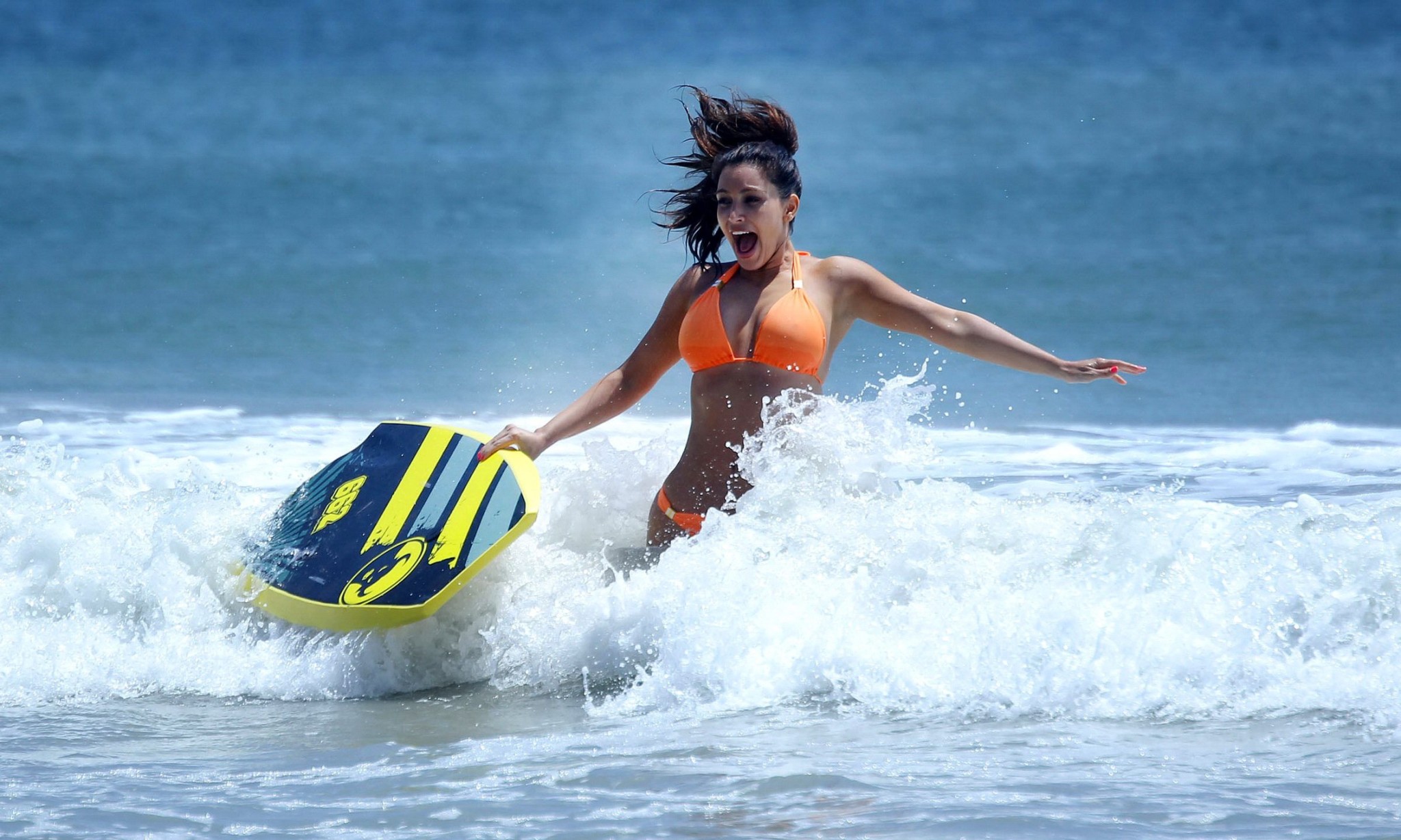 Kim Kardashian shows pokies in wet orange bikini while surfing in Mexico #75262272