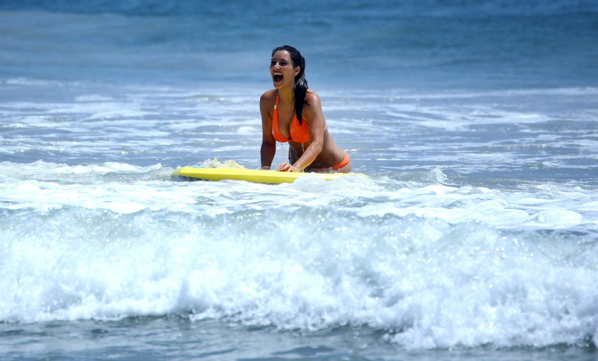 Kim Kardashian shows pokies in wet orange bikini while surfing in Mexico #75262279