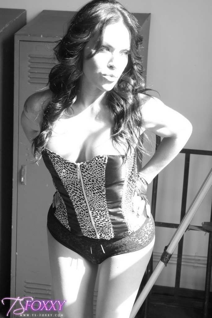 Sexy shemale posing in a corset #79243277