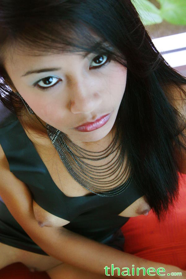 Thai teen model wears a rubber mini skirt and shows off her perky little tits #67803371
