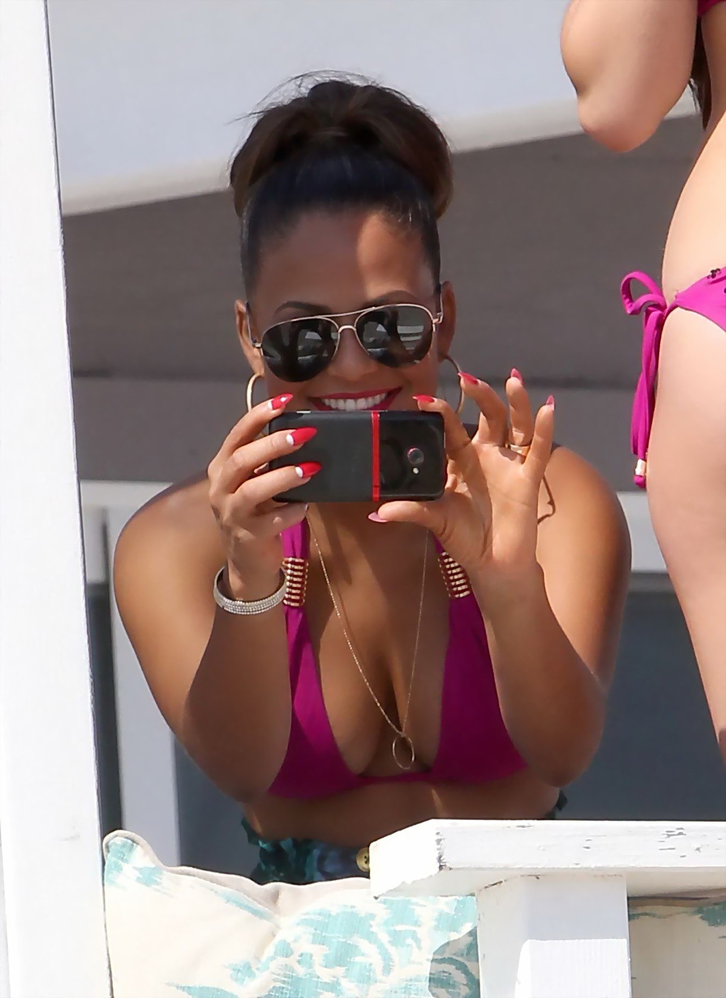 Christina Milian shows pokies and huge boobs wearing pink bikini top at Havana N #75254152