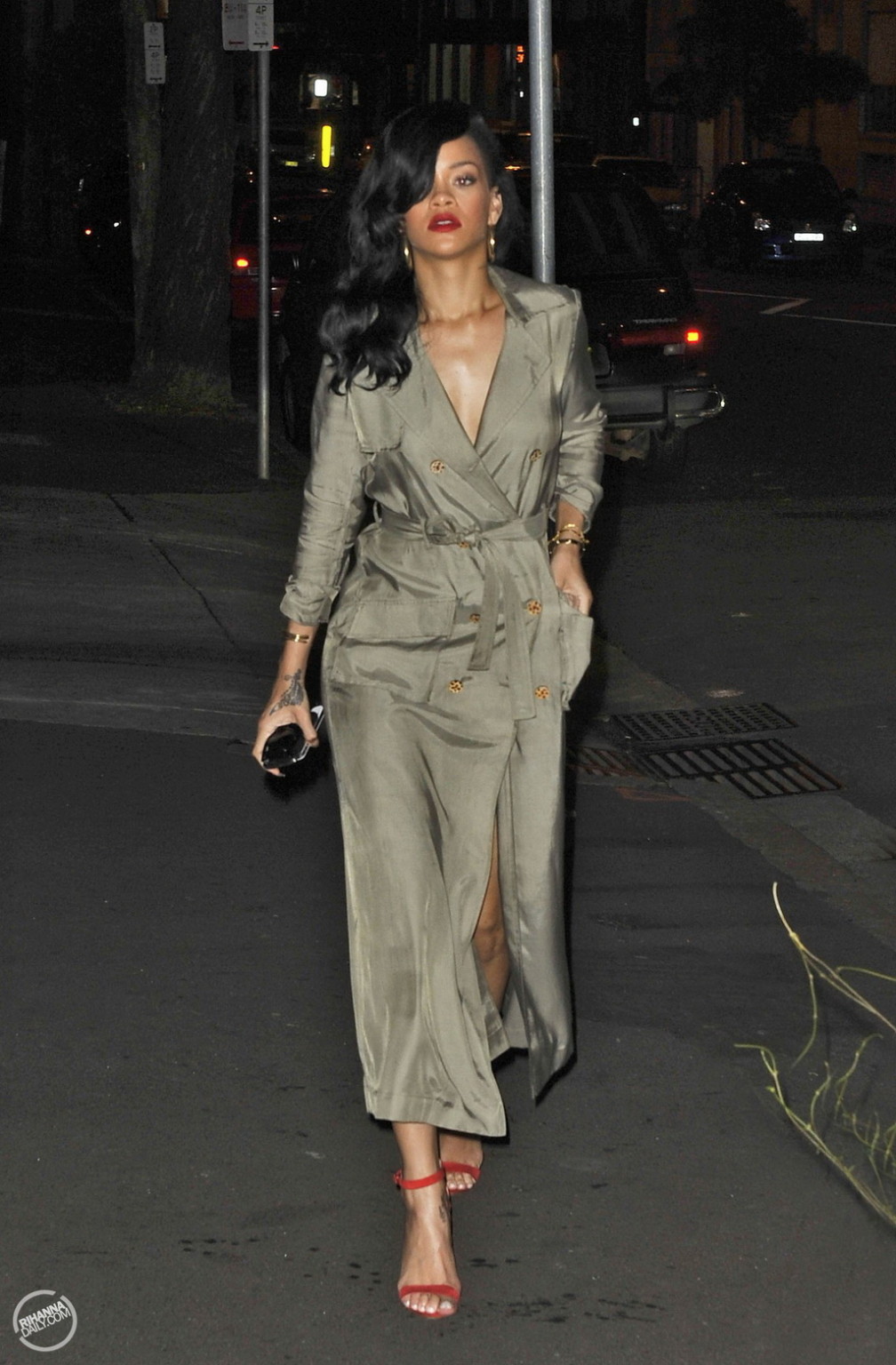 Rihanna showing big cleavage  long legs in wide open topcoat out in Sydney and a #75266792