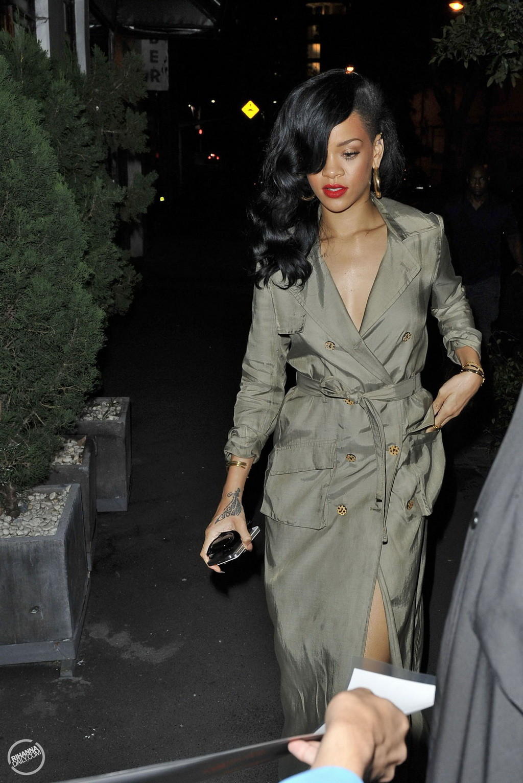 Rihanna showing big cleavage  long legs in wide open topcoat out in Sydney and a #75266812