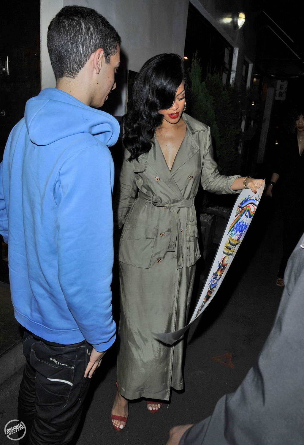 Rihanna showing big cleavage  long legs in wide open topcoat out in Sydney and a #75266842